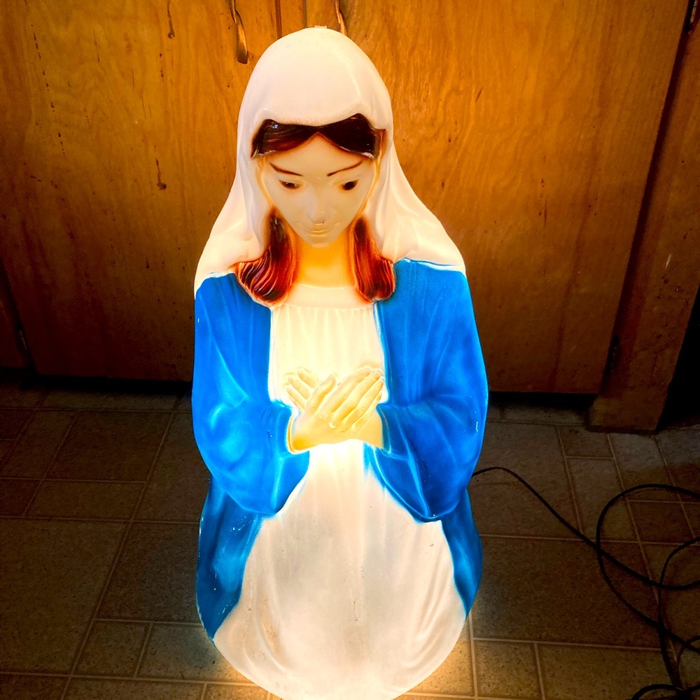 Christmas morning lighted nativity scene Mary mother of Jesus
